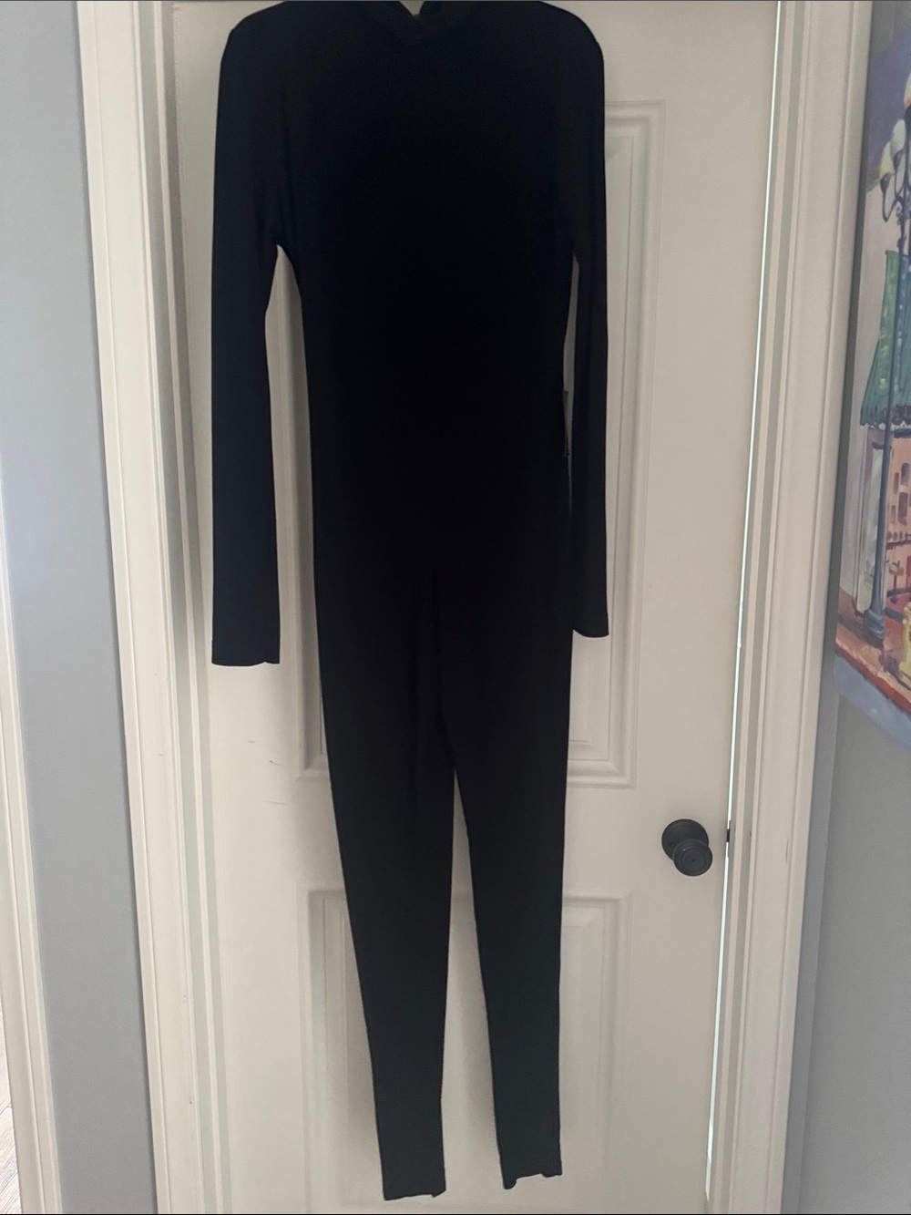 Norma Kamali Catsuit with footie
4 way stretch fabric adds up to 2” of give
